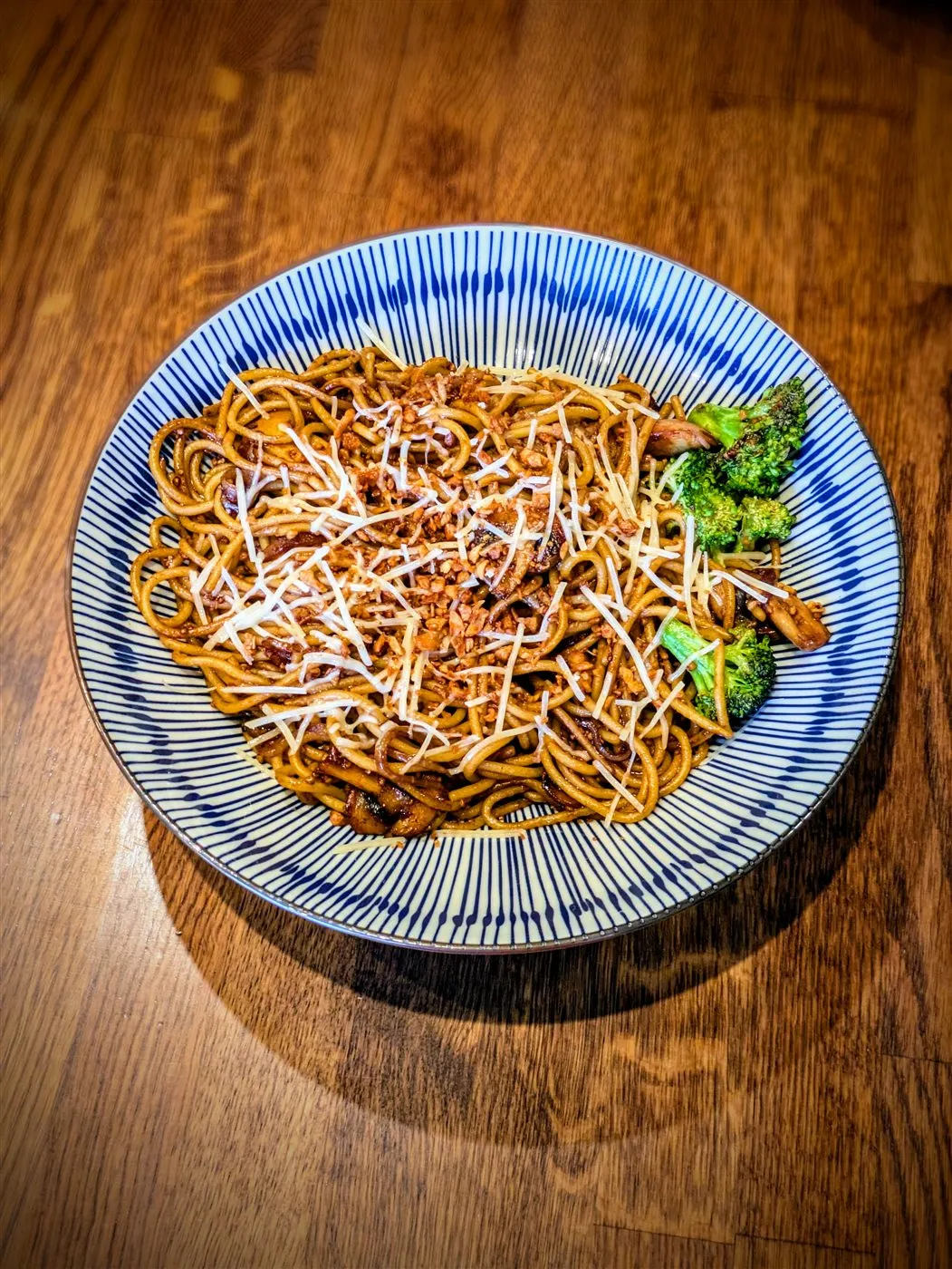Wok-tossed garlic noodles with mushrooms and grilled onions at Fire Pho in Huntington Beach, CA.