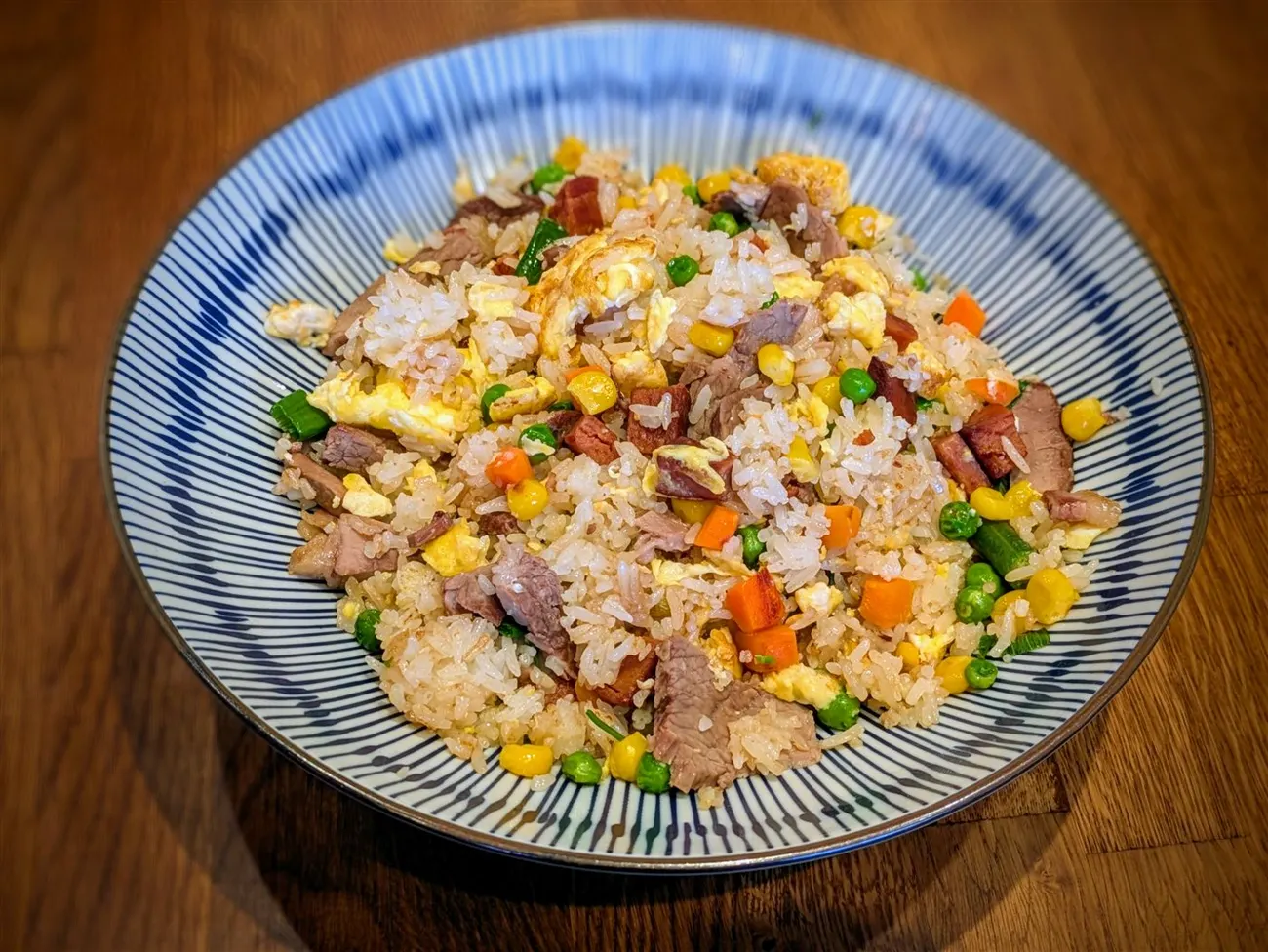 Plate of Street Royalty fried rice with spam, egg and mixed vegetables at Fire Pho in Huntington Beach, CA.